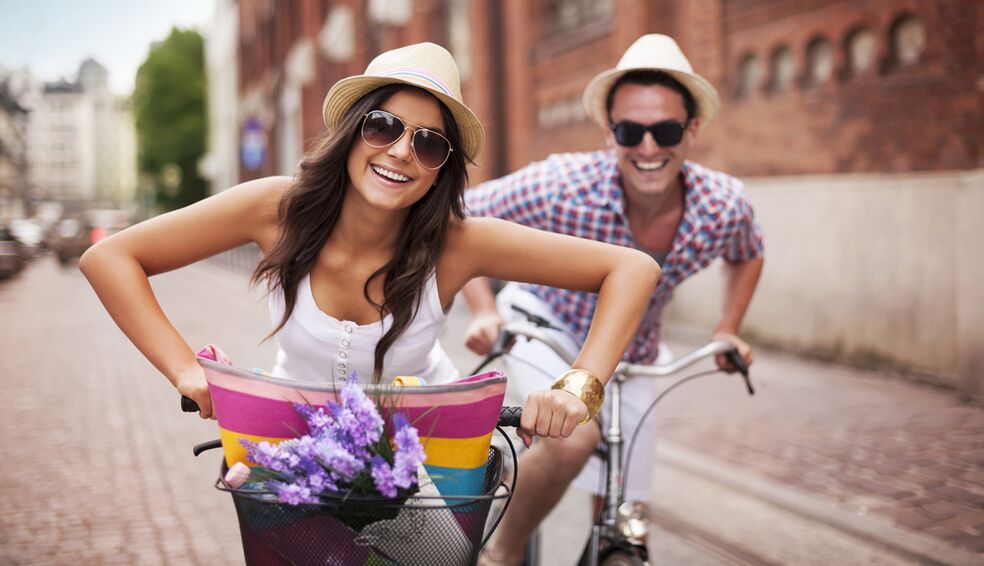 Woman with a man on bicycles
